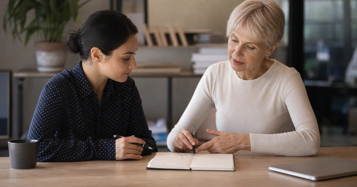 A candidate discussing career plans with a mentor.